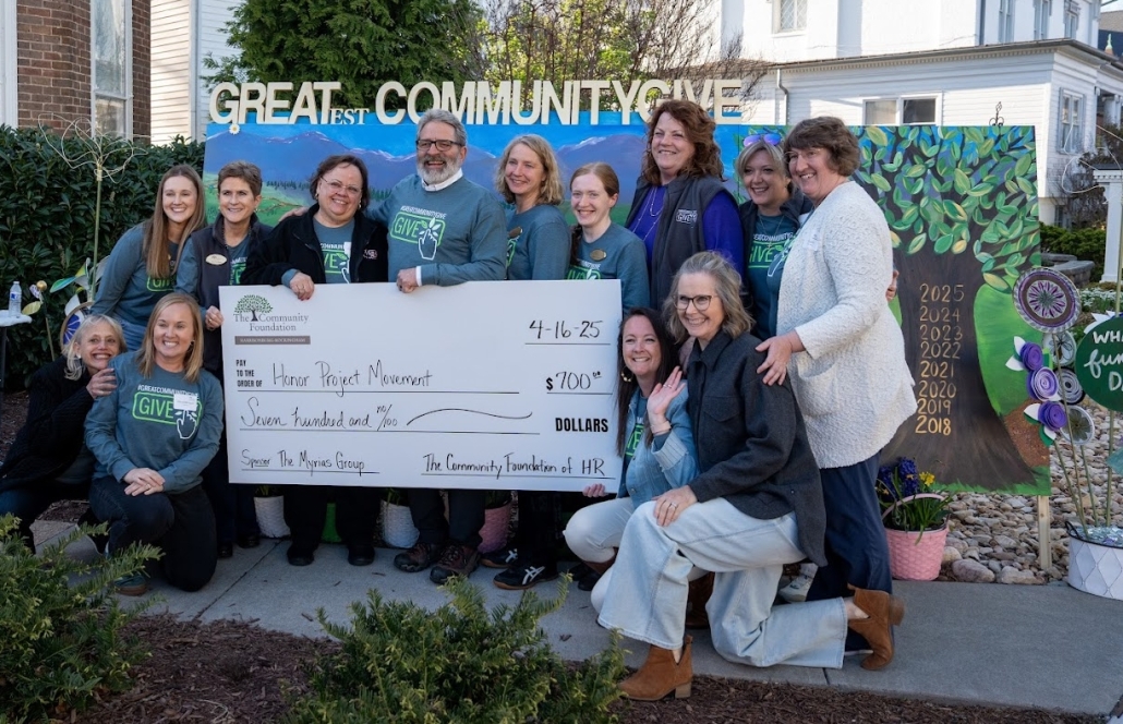 A photo of donation recipients at the Great Community Give