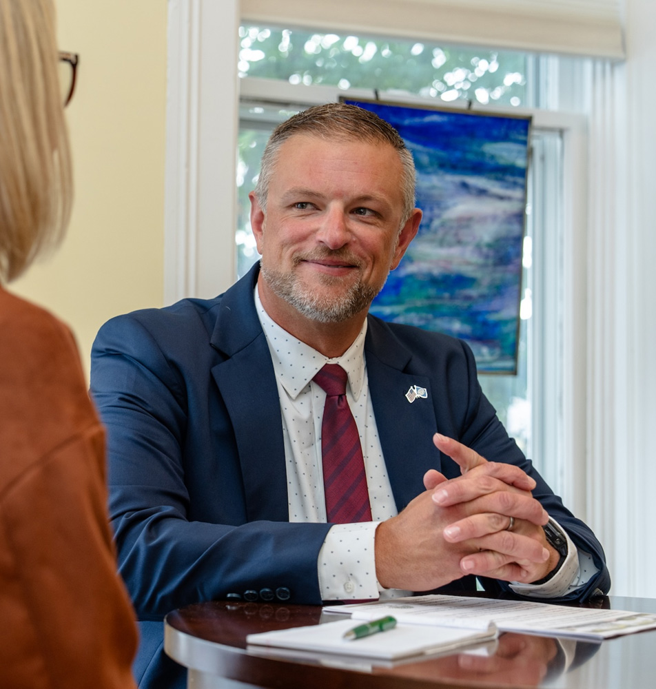 man in suit smiling