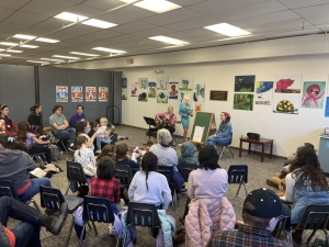 Rebecca Porter sings at a Storytime event at Massanutten Regional Library for Dolly Parton's 80th birthday.